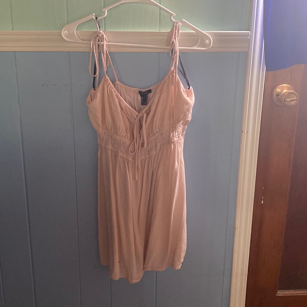 Not true to its sizes, it’s a Large but feels like a S/M